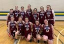 Silver medals awarded to players on the Mobile Monarchs Grade 9 girls basketball team