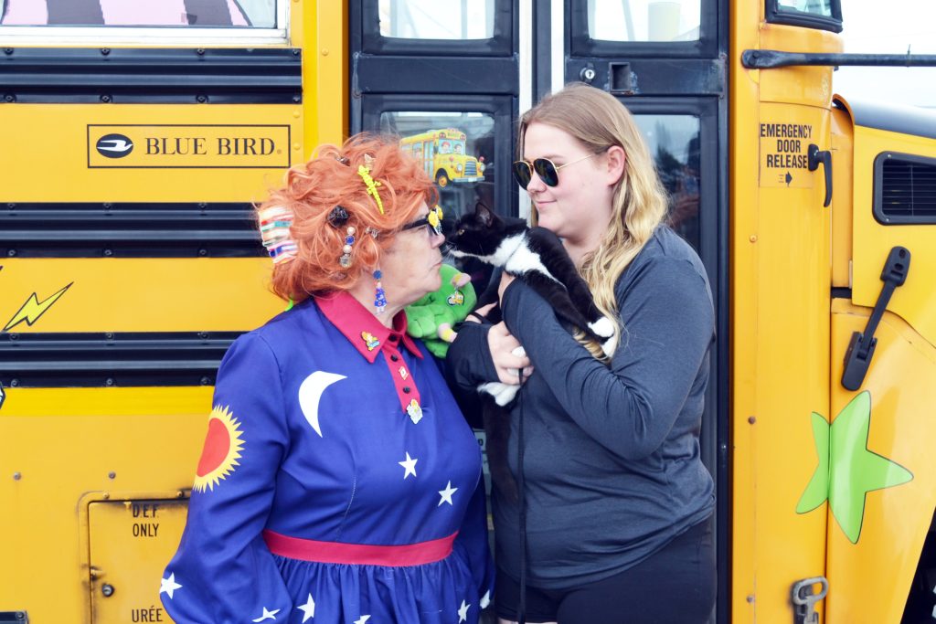 Ms. Frizzle and her Magic School Bus got a lot of attention when they were spotted in the parking lot of Powell's Supermarket in Bay Roberts recently. Operated by Bursey's Bus Service and decorated to look like the bus in the children’s show of the same name, the conveyance takes Ms. Frizzle, played by bus driver Debbie Warford, and her lizard Liz, to community and charity events. Ms. Frizzle was returning from an event in Upper Island Cove and had stopped at Powell's to do some shopping when people started running up for a picture. Among them was Dorrie Power, who had been out for a drive with her four-month-old kitten, Ralphie. There was no word on how Ralphie and Liz got along. Olivia Bradbury photo